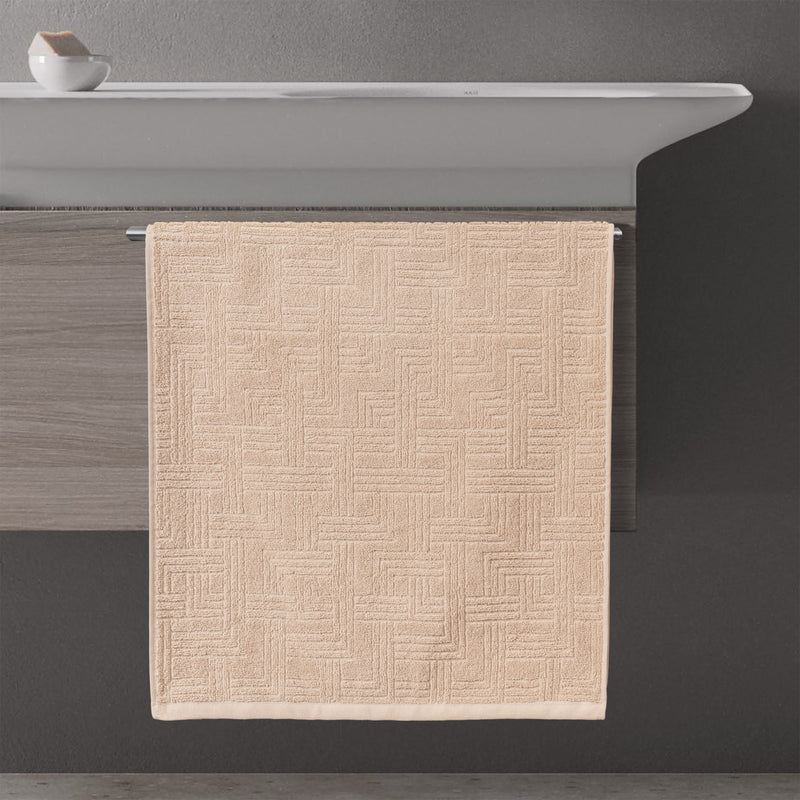toalla jacquard geométrico baño 50x100 arena ambiente