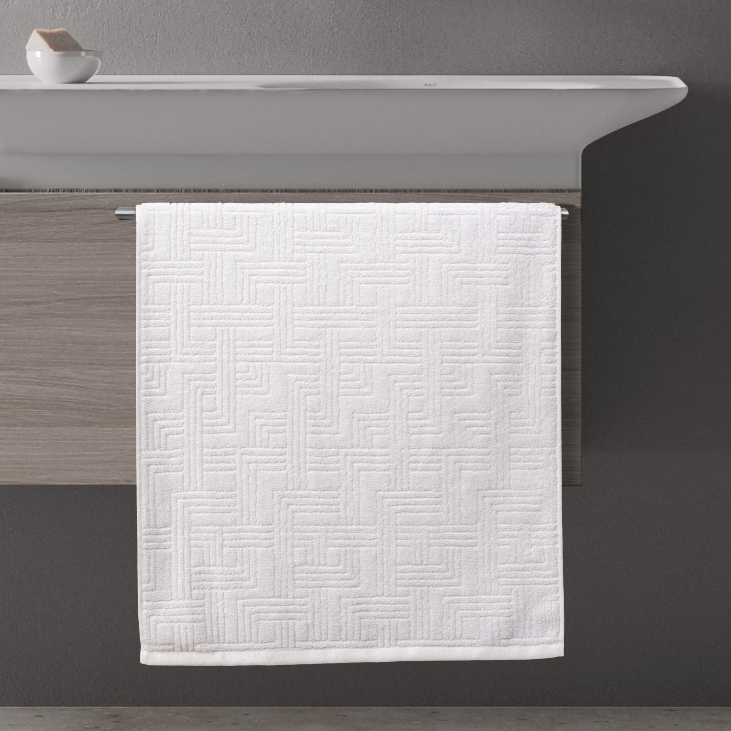 toalla jacquard geométrico baño 50x100 blanco ambiente
